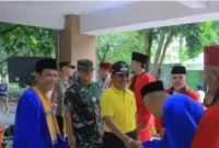 Longmarch Kirab Budaya Forum OKP dan Ormas se-Kecamatan Pinang, di halaman Kantor Kelurahan Kunciran Indah, Kecamatan Pinang pada Minggu pagi (12/3/2023).