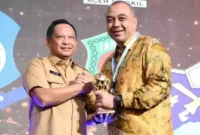 Penyerahan Penghargaan Universal Health Coverage (UHC) Kepada Pemerintah Daerah di Balai Sudirman Jakarta Selasa (14/3).