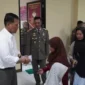 Foto: Kasatpol PP Kabupaten Tangerang Fachrul Rozi saat menggelar Santunan 