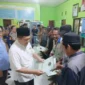 Keterangan foto : Warga UPT Kumang-kumang Desa Sungai Pasir, Kecamatan Lulau Laut Tengah, Kabupaten Kotabaru, Provinsi Lalimantan Selatan (Kalsel) menerima sertifikat tanah, Jumat (12/5/2023)