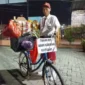 Foto: Kamandani Tukang Kopi Keliling di Tangerang Memakai Seragam SD/doc.igor.