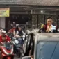 Foto: Suasana Kedatangan Adi Darmawan Laksono Atlet Seagame Kamboja di iring Masyarakat saat kembali ke Tempat Tinggal nya di Daon Rajeg . Minggu (21/5).