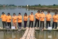 Foto: PT YKK AP Indonesia Tanam 5000 mangrove di Ketapang Kecamatan Mauk Kabupaten Tangerang, Senin (26/6).