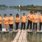 Foto: PT YKK AP Indonesia Tanam 5000 mangrove di Ketapang Kecamatan Mauk Kabupaten Tangerang, Senin (26/6).