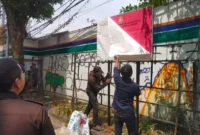 Keterangan foto : Kejaksaan Negeri (Kejari) Kota Malang dan Tim Penyidik Jaksa Agung Muda Bidang Tindak Pidana Khusus (Jampidsus) menyita 10 bidang tanah seluas 4.975 meter persegi di Kelurahan Jatimulyo, Kecamatan Lowokwaru, Kota Malang, Kamis (7/9/23)