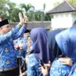 Keterangan Foto: Bupati Tangerang Ahmed Zaki Iskandar menjadi pembina apel untuk yang terakhir kalinya sebagai Bupati Tangerang