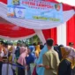 Ratusan emak-emak berkumpul di lapangan Mapolda Lampung rela mengantre mendapatkan beras Stabilisasi Pasokan dan Harga Pangan (SPHP) Bulog dan kebutuhan pokok murah lainnya, Kamis (7/3/2024).