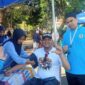 Keterangan poto : Suasana team kesehatan saat melakukan pemeriksaan kepada salah satu masyarakat saat kegiatan Pemeriksaan Kesehatan secara massal yang di gelar SMK PGRI Rangksbitung dalam rangka ikut memeriahkan HUT Bhayangkara ke 78 Tahun. di Alun - alun Rangkasbitung
