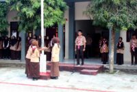 Keterangan poto : Suasana pengibaran bendera saat HUT Pramuka di Halaman SMKN 2 Rangkasbitung Kab Lebak 14/8/2024