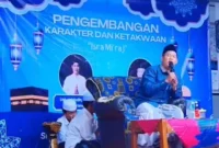 Keterangan poto : Penceramah dari KUA KecMatan Maja, saat memberikan Tausyiaah dalam acara Isra Mi'raj 1448 Hijriaj yang di gelar SMAN 2 Maja Kab Lebak Banten, pada 15 Januari 2026
