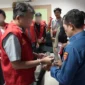 Keterangan foto : Tahap II penyerahan tersangka dan barang bukti terkait tindak pidana korupsi pemberian Kredit Usaha Rakyat (KUR) Mikro serta pengelolaan aset kas besar (khasanah) pada salah satu Bank Pemerintah Kantor Cabang Pembantu Semendo, Kabupaten Muara Enim, Kamis (12/2/2026)