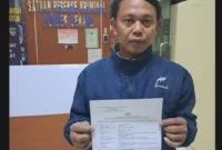 Keterangan foto : Seorang karyawan berinisial RA resmi melaporkan SP, yang diketahui menjabat sebagai Wakil Ketua Serikat Pekerja Nasional (SPN) di lingkungan PT Nikomas Gemilang, ke Satreskrim Polres Serang, Jumat (27/2/2026)