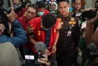 Keterangan foto : Kejaksaan Tinggi Sumatera Selatan telah menetapkan dua orang tersangka terkait dugaan gratifikasi dan suap dalam proyek Pengembangan Jaringan Irigasi Ataran Air Lemutu, Kecamatan Tanjung Agung, Kabupaten Muara Enim, Kamis (19/2/2026)