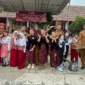 Keterangan poto: Kepala SDN 1Mekarjaya berpoto bersama Peserta Didik dan Dewan Guru usai acara Lomba FLS3N Tingkat Kecamatan pada 28/4/2026