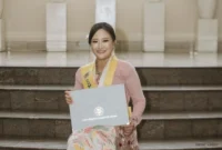 Keterangan foto : Jessy Wijaya (30) dalam prosesi wisuda Program Pascasarjana Universitas Gadjah Mada (UGM), Sabtu (2/5/2026)