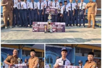Keterangan poto : Kepala Sekolah SMPN 3 Rangkasbitung saat berpoto bersama tim Futsal beserta Pelatih dan opicial peraih juara 2 Turnamen Futsal Kapolres Cup antar pelajar tahun 2026