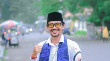 Kang Mega, Ketua Forum 9 Naga Karian
